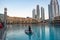 Downtown Dubai - View of Dubai Mall exterior and Dubai Fountain - Travel destinations and city attractions