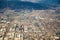 Downtown los angeles skyline and suburbs from airplane and smoke from wild fires