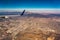 Downtown los angeles skyline and suburbs from airplane and smoke from wild fires