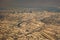 Downtown los angeles skyline and suburbs from airplane and smoke from wild fires