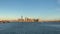 Downtown Manhattan and Ellis Island at sunset, view from the Upper New York Bay