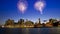 Downtown Manhattan skyline with dramatic fireworks