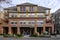 Downtown Mercer Island, modern mixed-use building, planters and benches on sidewalk