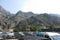 Downtown scene with Mountains Lovcen in the background of Kotor in Montenegro