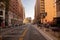 Downtown street with bicycle track and exterior Buildings in Los Angeles, California with sunlight