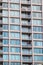 DOWNTOWN VANCOUVER, BC, CANADA - MAR 24, 2020: A couple that is self quarantining coming out on their balcony at 7pm to