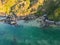 Downward aerial view of beach and crystal clear water