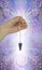 Dowsing with Lapis Pendulum in sparkling spiral energy field