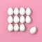 Dozen of eggs on pink background