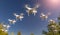 Dozens of Drones Swarm in the Clear Sky