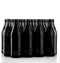 Dozens of empty, black German beer bottles