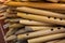 Dozens of handmade bamboo flutes in display