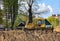 Dozer working at construction site. Bulldozer for land clearing, grading, pool excavation, utility trenching and foundation