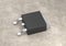 DPAK mosfet electronic transistor on surface 3d illustration