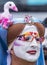 A drag queen with a pink flamingo on the head attending the Gay Pride parade also known as Christopher Street Day CSD in Munich