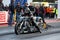 A drag race bike speeding up in quarter mile race with nitro burning