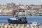 Dragger and lobster boat crossing New Bedford inner harbor
