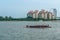 Dragon boat rowers are practising for competition at Kallang Basin, Singapore.