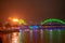 Dragon bridge in Da Nang, Vietnam, at night. The dragon blowing hot fire out of its mouth. A famous attraction in Da Nang