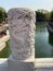 A dragon carved onto a marble post