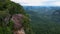 Dragon crest rock in the jungle of Krabi Thailand, couple men and woman looking out over jungle