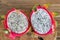 Dragon fruit on old wooden table background