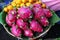 Dragon fruit or pitaya in the basket on fruit mark