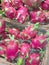 Dragon fruit pitaya pitahaya in wicker baskets in a supermarket