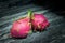 Dragon fruit placed on a marble countertop.