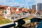 Dragon statue bridge over Ljubljanica River and cityscape of Ljubljana