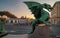 Dragon statue on Dragon bridge and Saint Nicholas Cathedral in background at sunset, Ljubljana, Slovenia