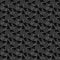 Dragonflies repeat pattern design, black and grey background.