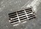 Drain grate on the road