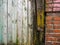 Drain rainwater from the roof of a building in the rain. Old rusty rainwater drainage