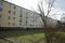 Draining rainwater from the water pipe of an apartment building into the garden. Berlin, Germany