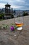 Dram glass of single malt scotch whisky and view from Calton hill to park and old parts of Edinburgh city in rainy day, Scotland,