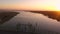 Dramatic aerial of drone flying over Oregon Bridge at beautiful sunset