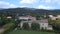 Dramatic aerial view flight drone. Italy summer Country medieval Charlie House