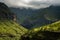 Dramatic afternoon light falls on the hills