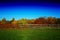 Dramatic autumn fence at countryside farm background