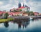 Dramatic autumn sceneof oldest overlooking the River Elbe castle - Albrechtsburg. Misty veneig cityscape of Meissen, Saxony,