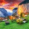 Dramatic autumn view of Lauterbrunnen valley with gorgeous Staubbach waterfall and Swiss Alps at sunset time