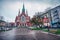 Dramatic autumn view of Parish of St. Joseph church. Rainy morning cityscape of Krakow, Poland, Europe. Traveling concept