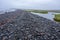 Dramatic beach of black pebbles in Iceland