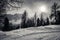 Dramatic black and white foggy snowcapped peaks mountain range in dolomites in wintertime, giau pass, italy