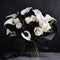 Dramatic bouquet with black calla lilies and white roses. Mother\\\'s Day Flowers Design concept