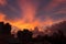 Dramatic city sky view with beautiful colors red orange black blue in India