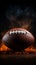 Dramatic close up of an American football ball surrounded by smoke