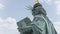 Dramatic close up view of the back of the Statue of Liberty in New York City