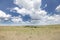 Dramatic cloud and the vast grassland of Masai Mara National Park